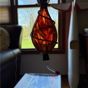 Handblown Glass Hanging hummingbird feeder Red and Orange with Dark Metal Spiral